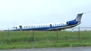UA8050 after a runway excursion 16 June 2010. (CBC Photo).